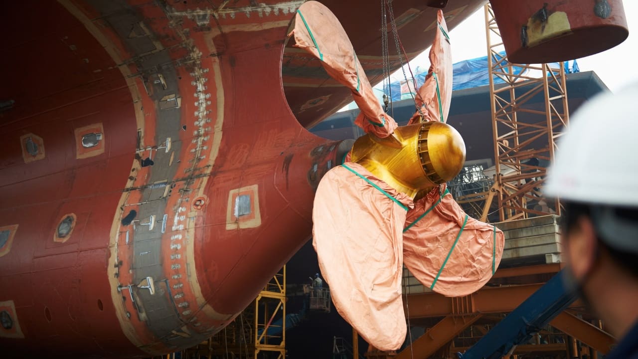 A propeller being fitted to a new hull in the yard